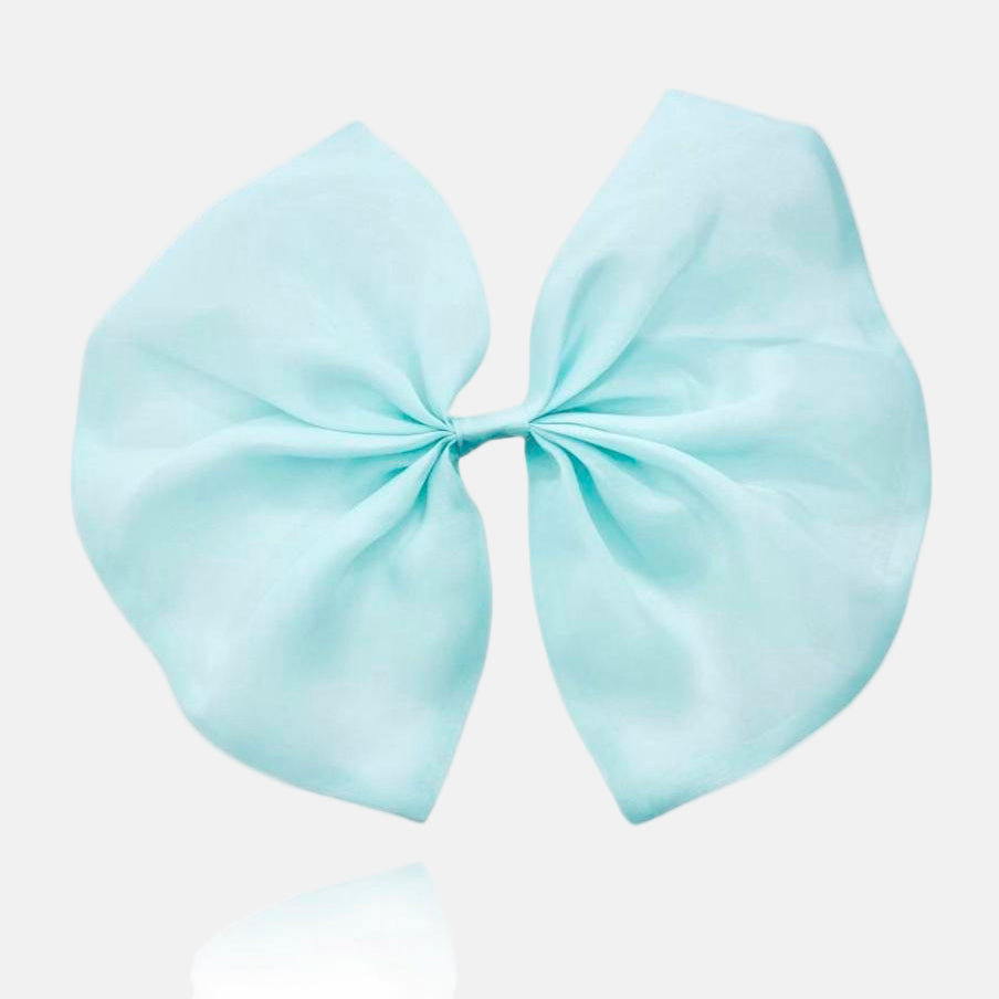 A tiffany blue organza hair bow with a clip attached, displayed on a white background.