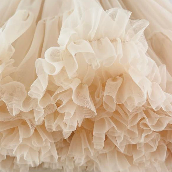Close-up of ruffled beige fabric