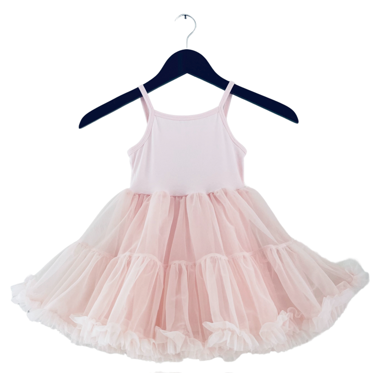 Pink tutu dress on a hanger against a white background