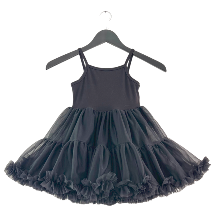 Black tutu dress on a hanger against a white background