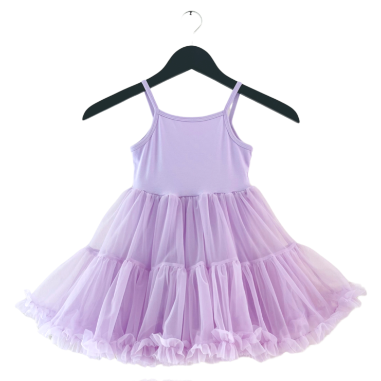 Lavender dress on a hanger against a white background