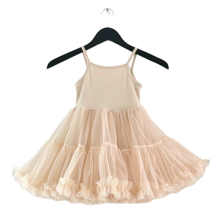 Beige dress with a layered skirt on a black hanger against a white background