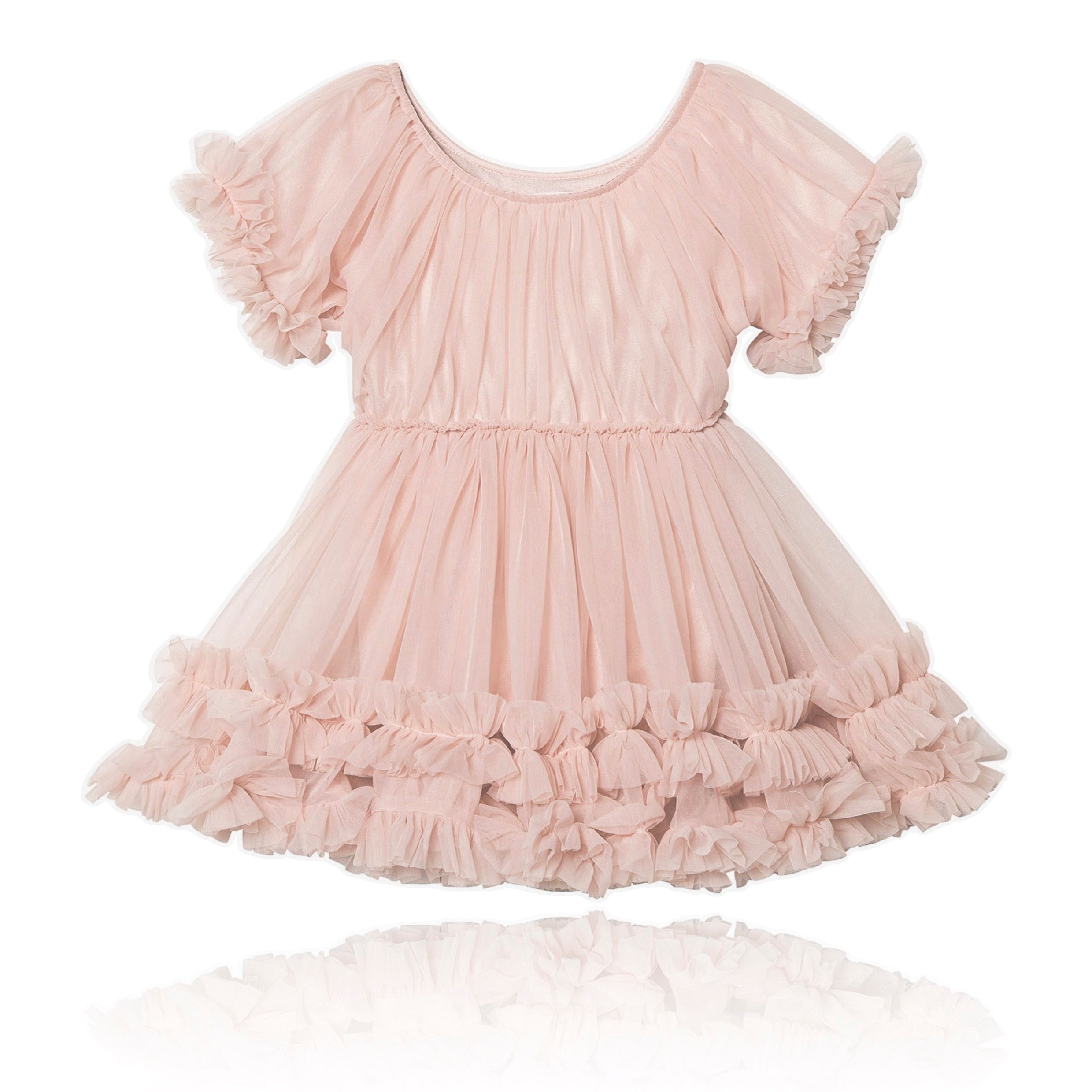 Pink dress with ruffled details on a white background