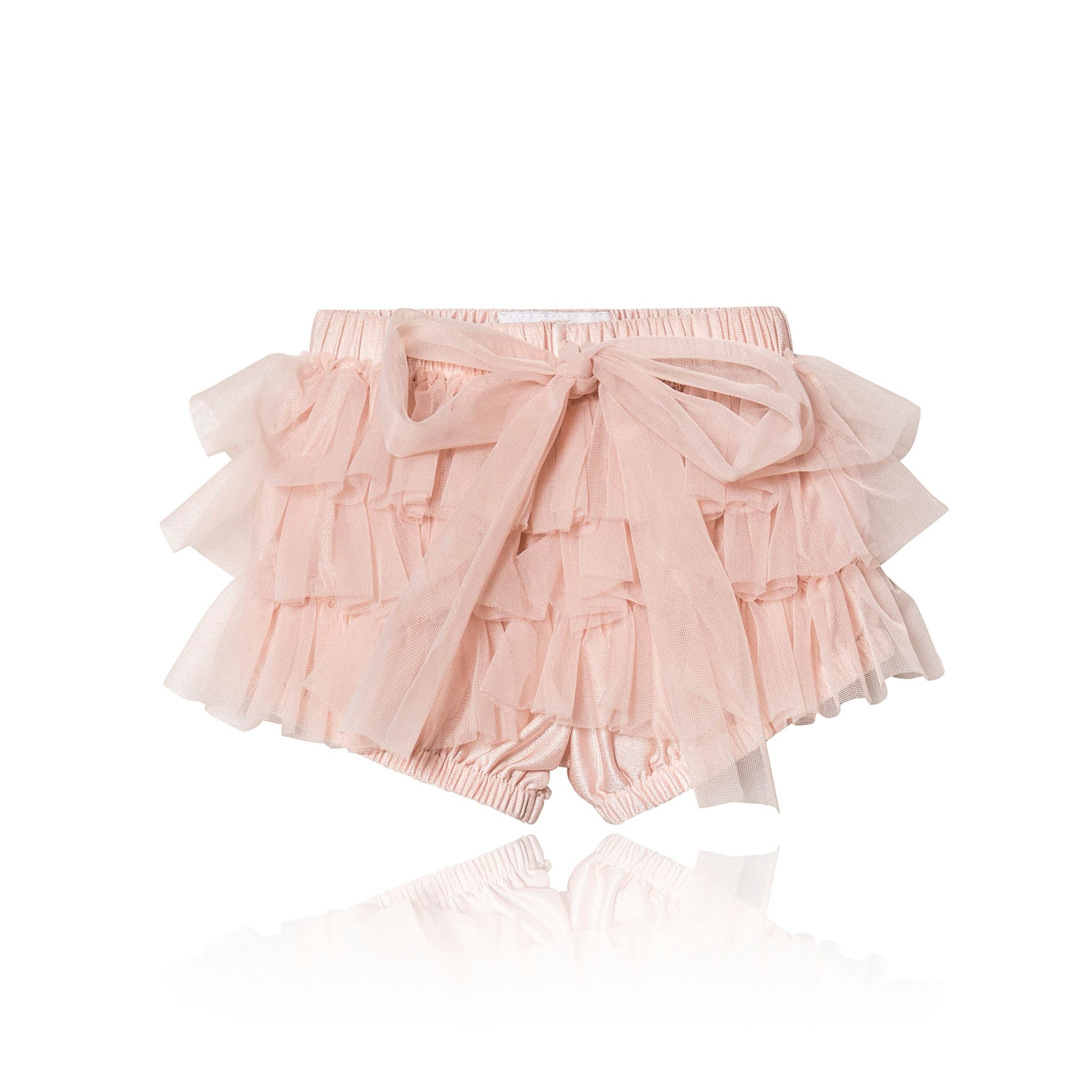 Pink ruffled bloomers on a white background