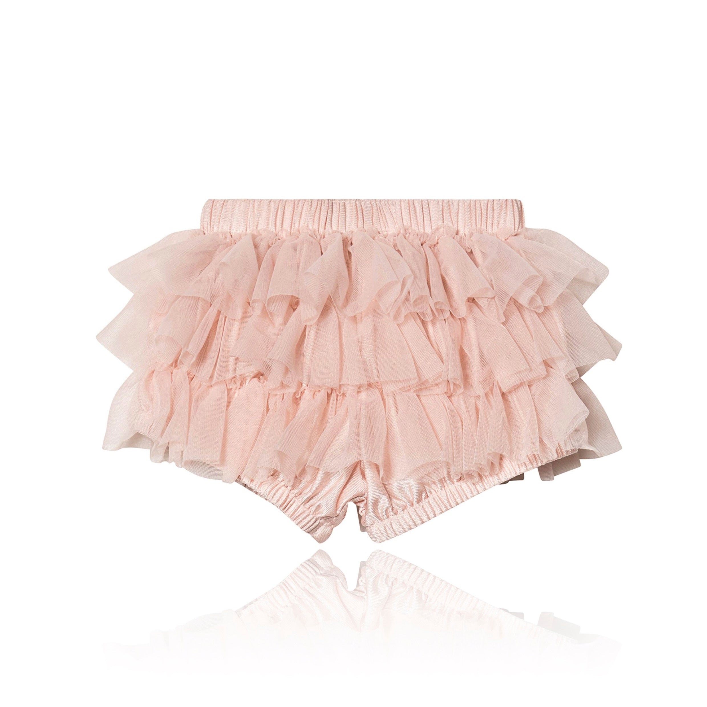 Pink ruffled bloomers on a white background