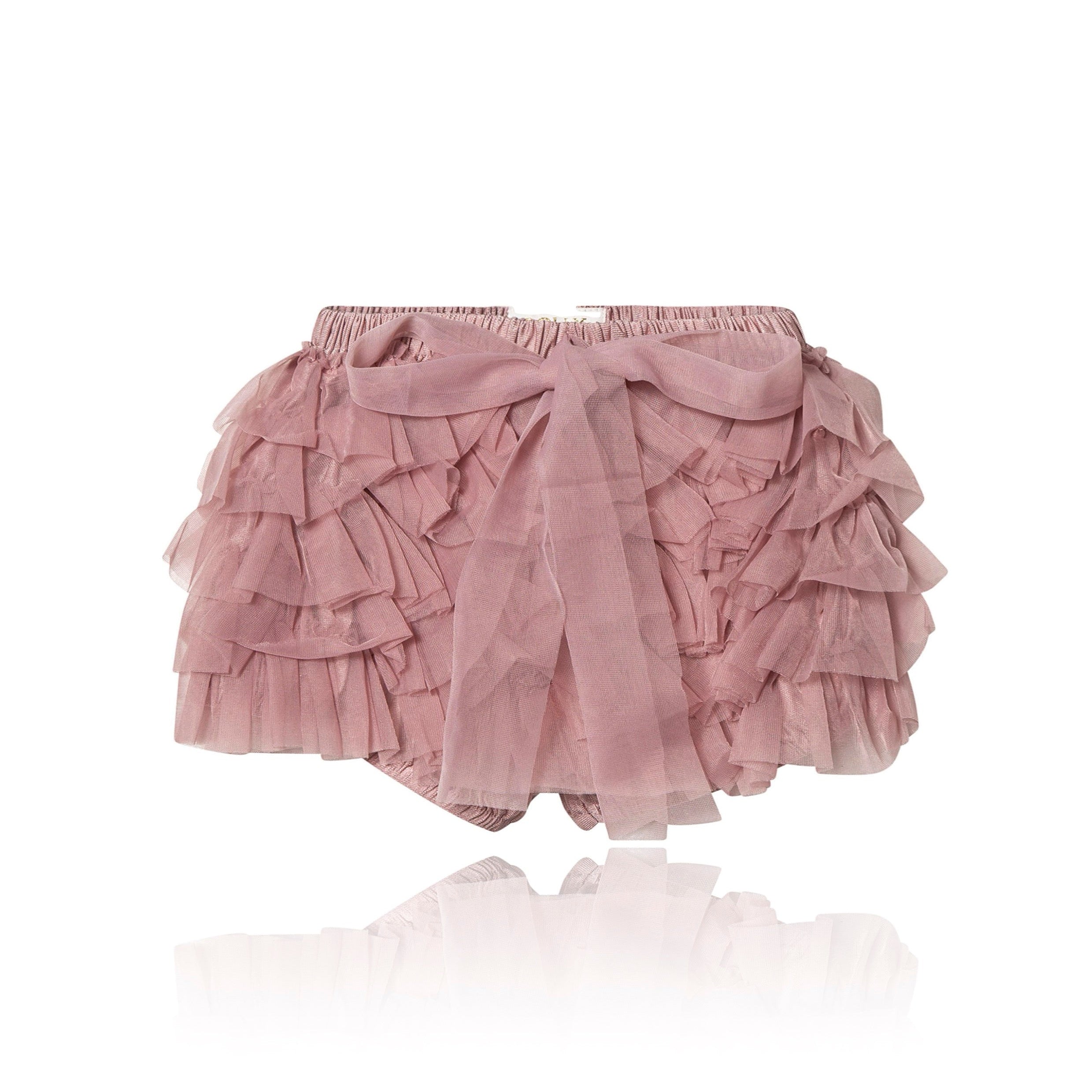 Pink ruffled shorts on a white background
