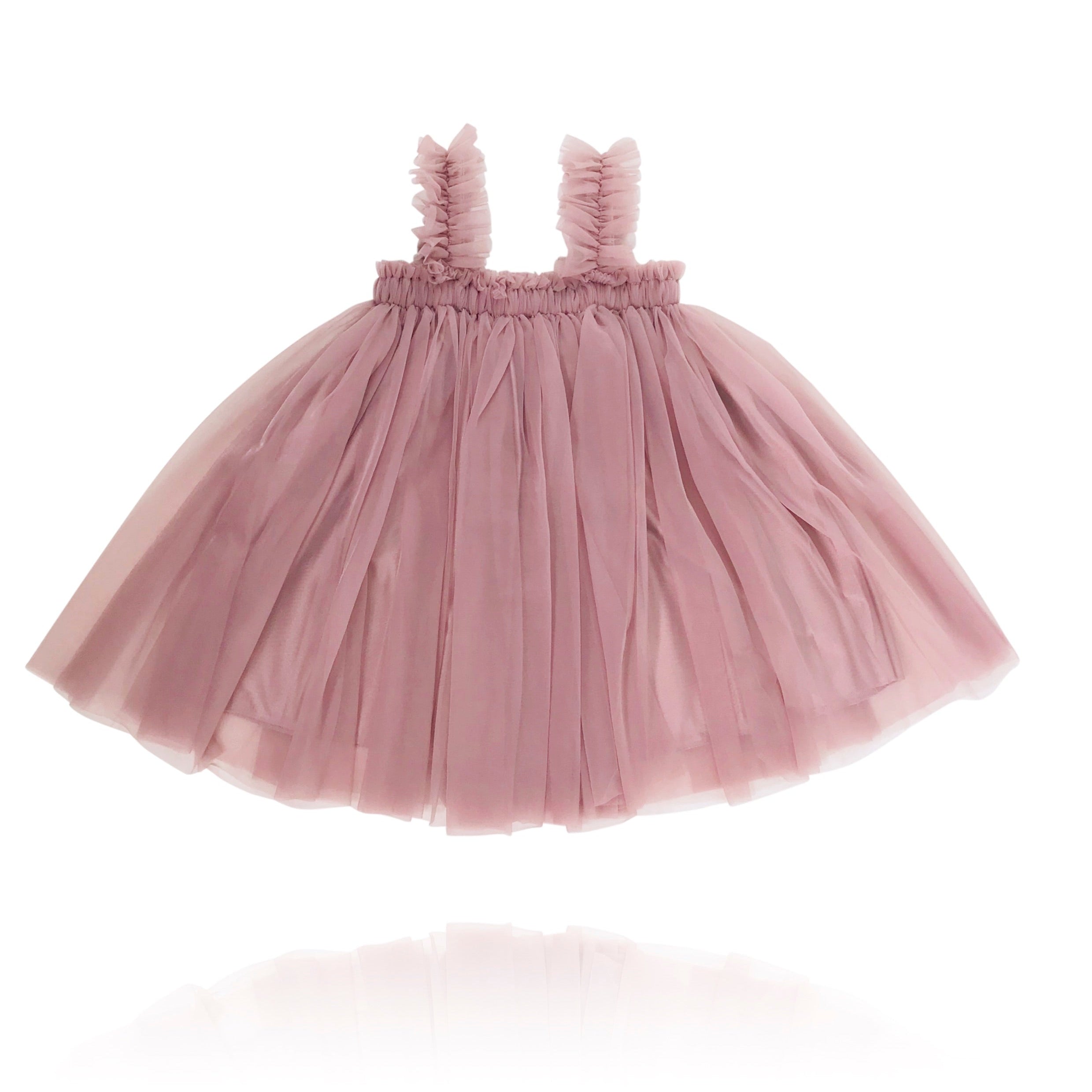 A mauve-colored DOLLY 2-way tutu dress with ruffled shoulder straps and an A-line silhouette, designed for children.