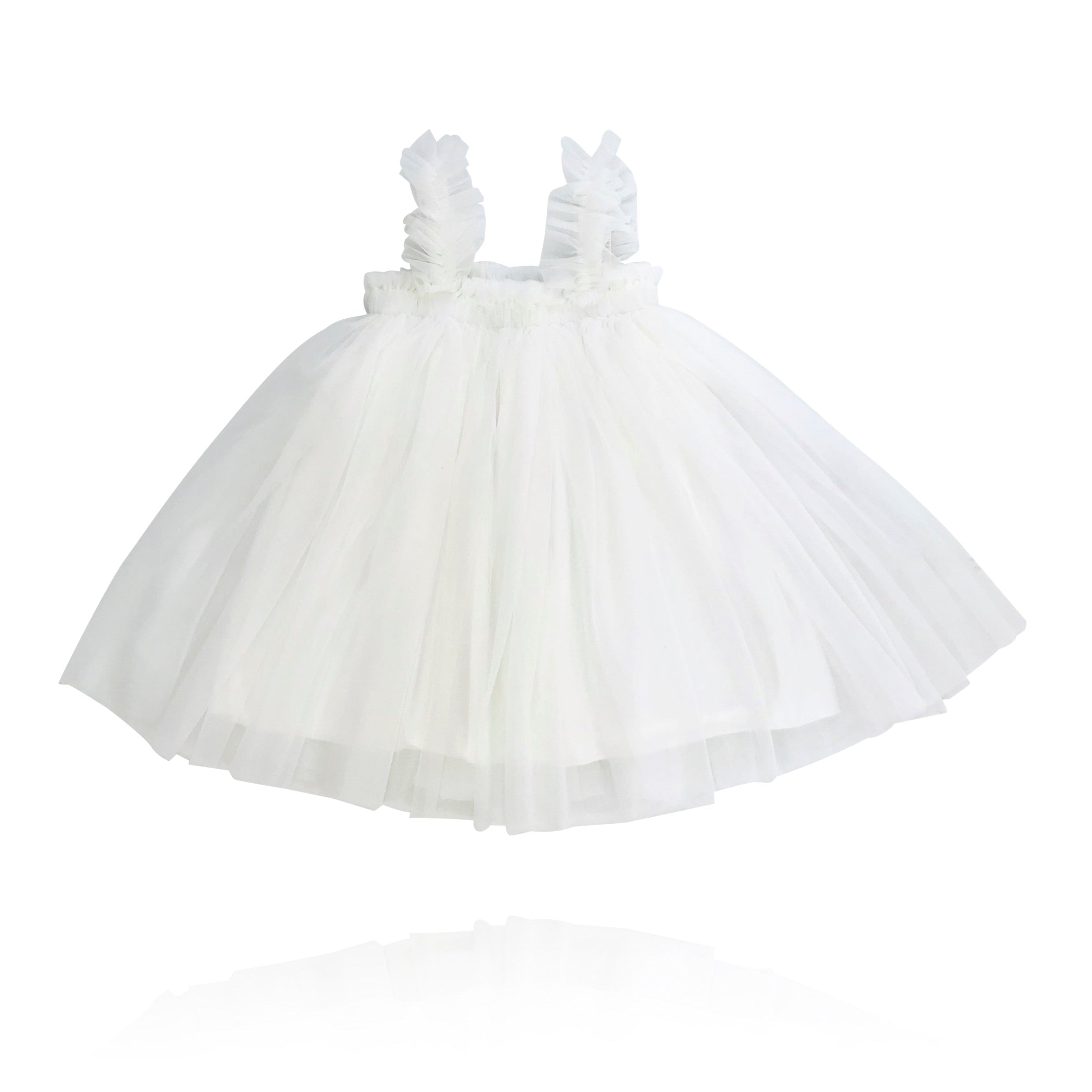 White tulle dress with thin straps on a white background